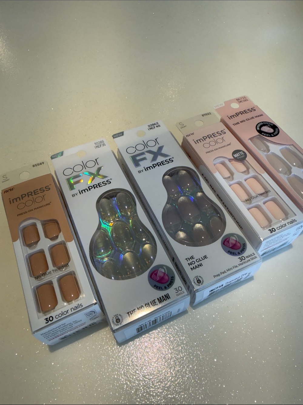 imPRESS Press-On Nail Set Assortment in Nude, Soft Pink, and Gray Tones